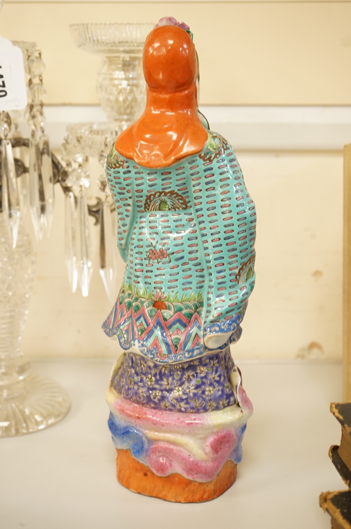 A Chinese enamelled porcelain figure of an immortal, Republic period, 32.5cm high